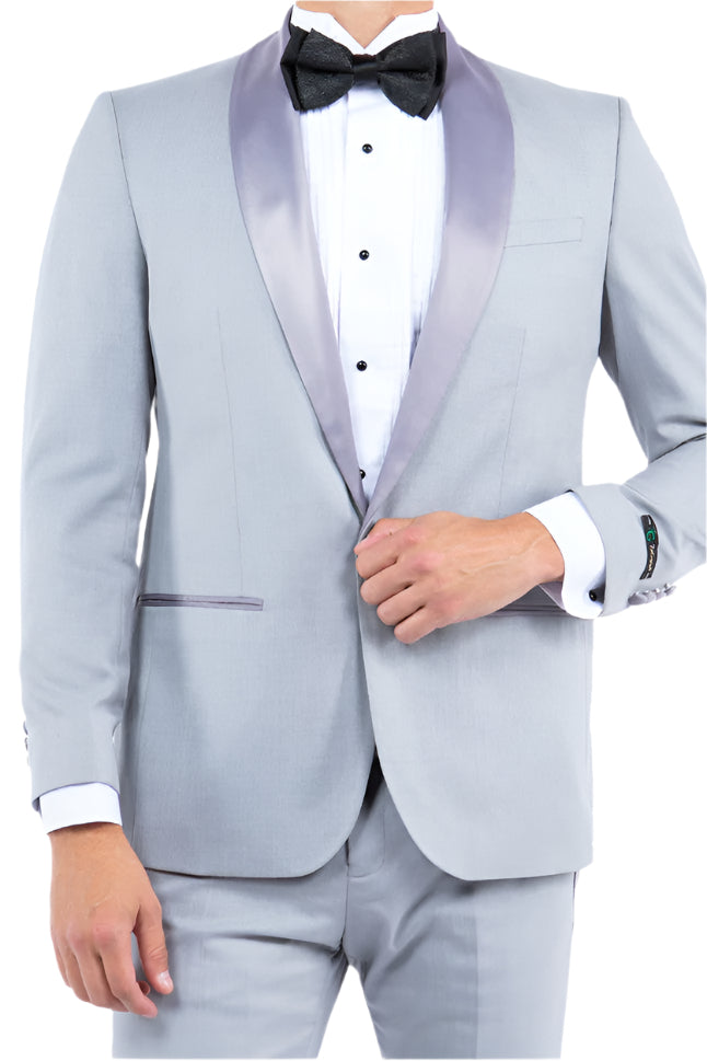 Man wearing a light gray tuxedo with a black bow tie on a white background