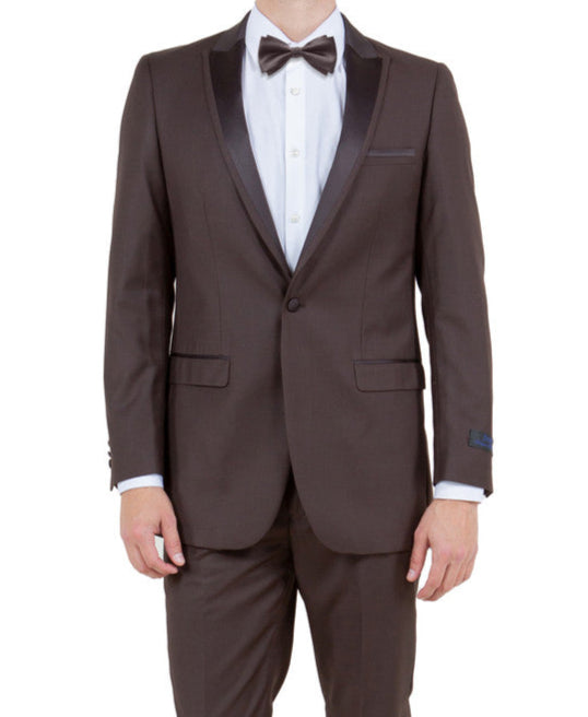 Man wearing a brown tuxedo with a bow tie on a white background
