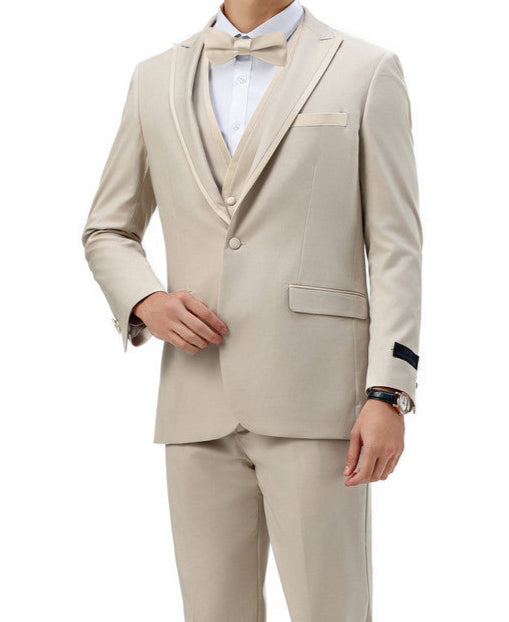 Man wearing a beige suit with a white shirt and black shoes on a white background